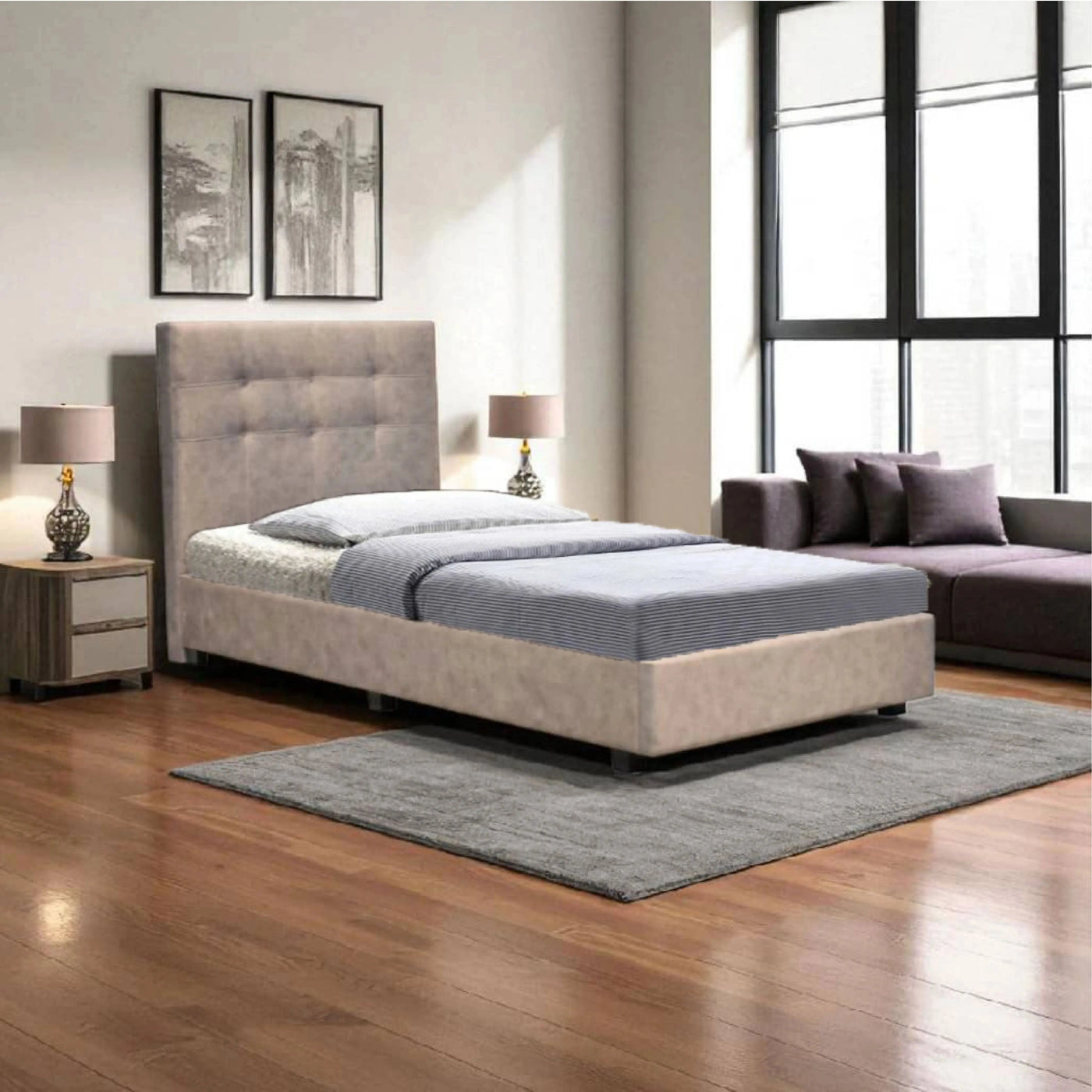 Modern grey fabric bed styled in a contemporary bedroom interior, highlighting its tufted headboard and clean design.